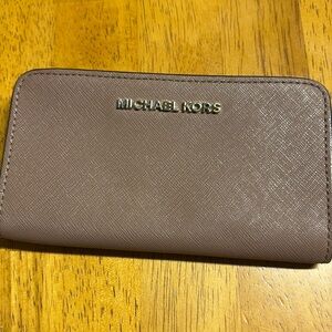 Micheal Kors regular size iPhone wallet used